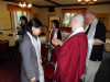 Jing Rui offering a gift to Ani Kunga. Photo: John Canti